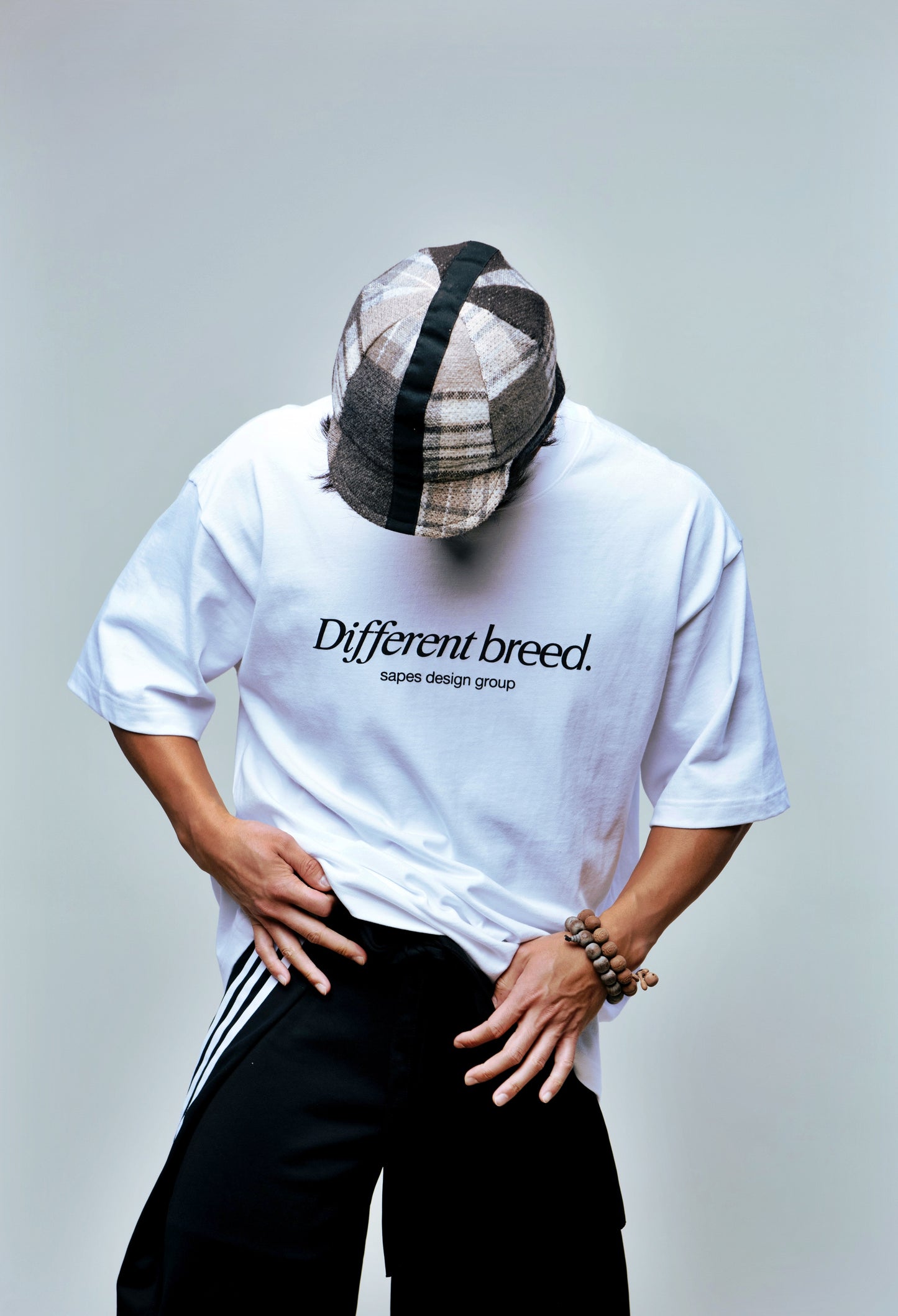 Different Breed Tee displaying front graphic on model.
